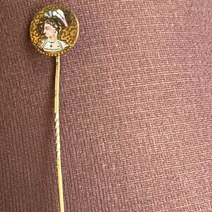 Antique 1800s lady in hat period attire hand painted stick pin; possibly gold?;